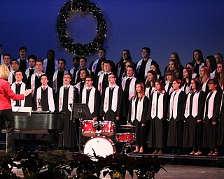 Neighbors | Abby Slanker.Under the direction of Canfield High School choir director Kelly Scurich, the concert choir performed holiday songs for family and friends at the Choral Music Department’s annual winter concert on Dec. 7.