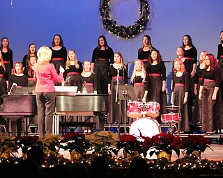 Neighbors | Abby Slanker.The Canfield High School One Octave Higher choir performed “The Kalanta of the New Year!” at the Choral Music Department’s annual winter concert on Dec. 7.