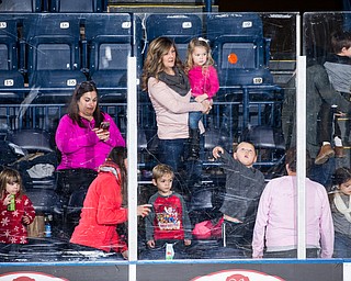Scott R. Galvin | The Vindicator.Youngstown Phantoms fans throw pucks on the ice for the chuck-a-puck contest in the second intermission during the School Day Game against the Cedar Rapid RoughRiders on Thursday, Dec. 14, 2017 at the Covelli Centre.
