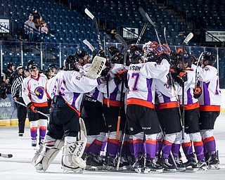 Scott R. Galvin | The Vindicator.The Youngstown Phantoms celebrate and congratulate teammate Eric Esposito on his overtime shootout winning goal against the Cedar Rapids RoughRiders on Thursday, Dec. 14, 2017 at the Covelli Centre.