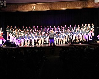 Above, the sixth-grade choir at West Branch recently rang in the holiday season with a concert. The choir, which has 125 members, is under 