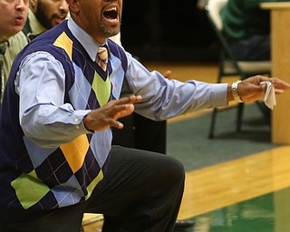 Ursuline head coach Keith Gunther calls out a play in the second quarter of a high school basketball game, Friday, Dec. 15, 2017, in Youngstown. South Range won 61-38...(Nikos Frazier | The Vindicator)