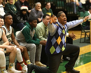 Ursuline head coach Keith Gunther calls out a play in the second quarter of a high school basketball game, Friday, Dec. 15, 2017, in Youngstown. South Range won 61-38...(Nikos Frazier | The Vindicator)