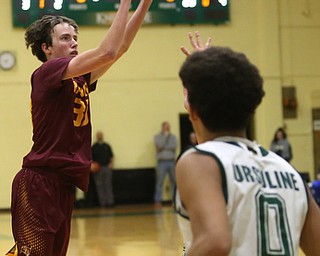 South Range center Brady White (33) goes up for three in the third quarter of a high school basketball game, Friday, Dec. 15, 2017, in Youngstown. South Range won 61-38...(Nikos Frazier | The Vindicator)