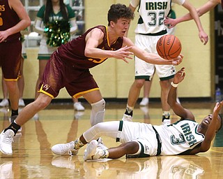 South Range guard Jaxon Anderson (23) reaches for the ball out of Ursuline point guard Braijon Nuby (3)'s hands in the third quarter of a high school basketball game, Friday, Dec. 15, 2017, in Youngstown. South Range won 61-38...(Nikos Frazier | The Vindicator)