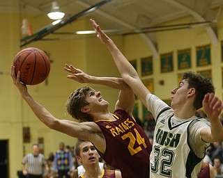 South Range forward Sam Brooks (24) goes up for two under the net in the third quarter of a high school basketball game, Friday, Dec. 15, 2017, in Youngstown. South Range won 61-38...(Nikos Frazier | The Vindicator)