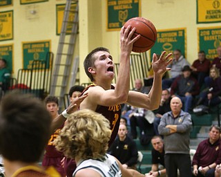 South Range guard Ben Irons (3) goes up for a layup in the third quarter of a high school basketball game, Friday, Dec. 15, 2017, in Youngstown. South Range won 61-38...(Nikos Frazier | The Vindicator)