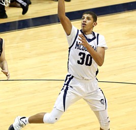 MCDONALD, OHIO - DECEMBER 15, 2017: McDonald's Braedon Poole (30) shoots and scores during the 1st qtr at McDonald High School.  MICHAEL G. TAYLOR | THE VINDICATOR