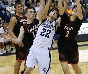 MCDONALD, OHIO - DECEMBER 15, 2017: McDonald's Ryan Scala (22), Springfield's Drew Clerk (2) and Springfield's John Ritter (13)  go for the rebound during the 4th qtr at McDonald High School.  MICHAEL G. TAYLOR | THE VINDICATOR