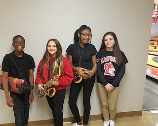 Members of the Campbell City School marching band were recently selected to participate in the OMEA District 5 Honors Band. The honors band is sponsored by the Ohio Music Education Association. Students are selected from Trumbull, Ashtabula and Mahoning counties to perform in the musical ensemble. Above, from left, are Quentin Goins, Hannah Beshara, Jada Thomas and Ana Denas.