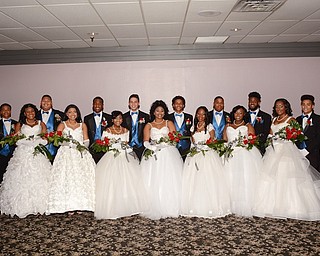 Above are the seven debutantes that were presented during the Junior Civic League of Youngstown’s annual Cinderella Ball along with their escorts, who represent high schools in Mahoning and Trumbull counties. Front row, from left, are Malaysia Hunter, Amber Bowie, Lauryn Laney, Myra Taylor, Allexus Minor, Rayvenne Bennett and Jerrica Walker. Back row, from left, are Matthew Harper, who served as this year’s page, and Khalyeo Bonner, Justin Clark, Jonas Rizzi, William Peterson, Randy Madison, Tylair Little and Jarred Miller. Below, from left, are Walker, first attendant; Bowie, Miss Cinderella 2017; and Laney, second attendant.