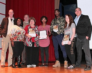 Chaney High School recently hosted a writing contest sponsored by the Youngstown State University Poetry Center and Etruscan Press. Winners received monetary awards ranging from $25 to $100. Above, from left, are Dr. Philip Brady, Etruscan’s executive director; Remica Bingham, outreach coordinator; Thomas Welsh, instructor; Angela Dooley; La’Rayja Hil; Cameron Dawson; Ciarra Taylor and Aaron Poochigian.   
