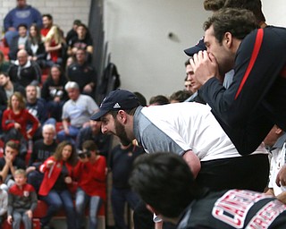 Canfield head coach Stephen Pitts calls out to a player during a OSHAA 152 pound wrestling tournament, Saturday, Dec. 16, 2017, in Canfield. ..(Nikos Frazier | The Vindicator)