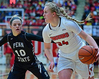 YOUNGSTOWN, OHIO - DECEMBER 20, 2017: Youngstown State's McKenah Peters drives on Penn State Beaver's Rachael Cummings during the first half of their game on Wednesday morning at Beeghley Center. DAVID DERMER | THE VINDICATOR