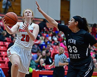 YOUNGSTOWN, OHIO - DECEMBER 20, 2017: Youngstown State's Kelley Wright goes to the basket against Penn State Beaver's Cheyenne Lopez during the second half of their game on Wednesday morning at Beeghley Center. DAVID DERMER | THE VINDICATOR