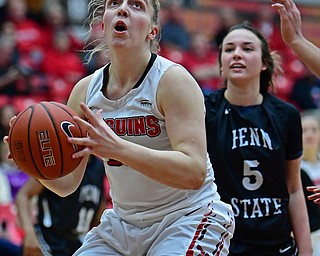 YOUNGSTOWN, OHIO - DECEMBER 20, 2017: Youngstown State's Anne Secrest goes to the basket against Penn State Beaver's Tara McFadden during the second half of their game on Wednesday morning at Beeghley Center. DAVID DERMER | THE VINDICATOR