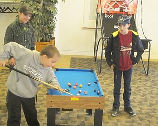 Neighbors | Zack Shively.The Austintown library looks to create a monthly game day to offer a fun event for the whole family starting next year. The library already had the materials for the game day.