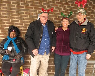 Neighbors | Zack Shively.The residents who pass out hot chocolate to the bell ringers are called the Brookdale "elves." Pictured are, from left, bell ringer Lawanna Dow and Brookdale residents Dale Gerkin, Helen Yask and Carl Yask.