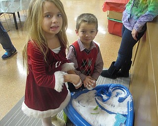 Neighbors | Zack Shively.In the activity room of the Lariccia Family Community Center, children played games and did crafts. Pictured are Paige and Blake Himes.