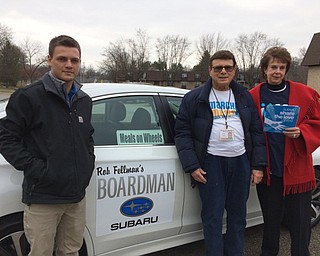 Neighbors | Zack Shively.Meals on Wheels of the Mahoning County and Boardman Subaru collaborated for Subaru's Share the Love Event. During the event, Subaru will donate $250 for every Subaru vehicle sold or leased to a participating charity, such as Meal on Wheels. Pictured, from left, are Kevin Succor of Boardman Subaru and volunteer Meals on Wheels drivers John Cisine and Karen Barr.