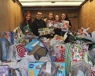 Neighbors | Abby Slanker.Canfield High School Student Council members, from left, Julia Petrallo, Dominic DeRamo, Clare Crescimanno, Melissa Dahman and Jillian Mt. Castle looked over the 300 items donated from the school to the Salvation Army Angel Tag Drive on Dec. 13.
