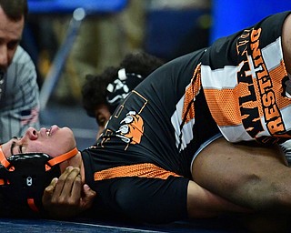 AUSTINTOWN, OHIO - DECEMBER 21, 2017: Howland's Alexander Smith fights to keep from being pinned by Boardman's Nathan Thompson during their 138lb bout, Thursday night at Austintown Fitch High School. DAVID DERMER | THE VINDICATOR