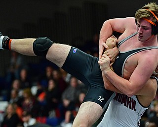 AUSTINTOWN, OHIO - DECEMBER 21, 2017: Howland's Ray Kaso is taken down to the mat by Boardman's Michael O'Horo during their 170lb bout, Thursday night at Austintown Fitch High School. DAVID DERMER | THE VINDICATOR