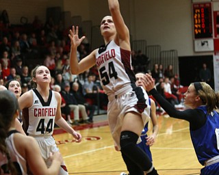 Canfield guard Serena Sammarone (54) goes up for a layup in the first quarter of an AAC high school basketball game, Friday, Dec. 23, 2017, in Canfield. Canfield won 45-34...(Nikos Frazier | The Vindicator)