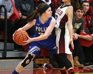 Canfield guard Ashley Veneroso (23) blocks out Poland guard Marlie McConnell (20) in the first quarter of an AAC high school basketball game, Friday, Dec. 23, 2017, in Canfield. Canfield won 45-34...(Nikos Frazier | The Vindicator)
