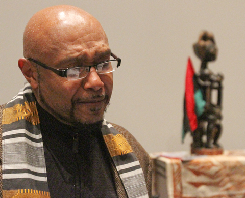 William D. Lewis  The Vindicator Rev Kenneth Simon, pastor New Bethel Baptist Chruch speaks during the first night of Kwanzaa at New Bethel Baptist Church in Youngstown 12-26-17.