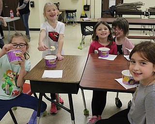 Neighbors | Abby Slanker.A group of Hilltop Elementary School first-graders enjoyed eating their ice cream during the PTO-sponsored ice cream social on Nov. 17.