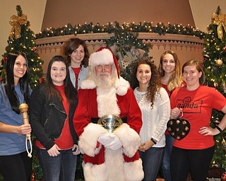 Neighbors | Submitted .Merdian HealthCare staff members pose with Santa during the 25th Breakfast with Santa. Pictured are, Janine Iacobucci (Prevention Educator), Ashley Morley (Prevention Coordinator), Michaela Walker (Prevention Educator), Angela Sammartino (Prevention Educator), Olivia Clark (Prevention Educator) and Melissa Proch (Prevention Educator).