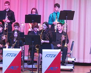 Neighbors | Zack Shively.Each of the three jazz bands at Fitch's Holiday Jazz Festival had a number of soloists who played during songs. Pictured, Jasmine Dahl performed a solo on her tenor saxophone during "You're a Mean One, Mr. Grinch."