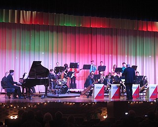 Neighbors | Zack Shively.The high school's jazz ensemble 2 played second during the Holiday Jazz Festival. Wesley O'Connor directed the band. They meet voluntarily twice a week in the morning before school to practice. Pictured, the group played "Baby It's Cold Outside."
