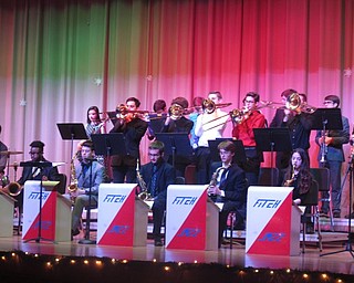 Neighbors | Zack Shively.Fitch's jazz ensemble 1 also performed a number of holiday songs, such as "The Most Wonderful Time of the Year" and "The Christmas Song." Pictured, the trombone section played a solo during "Feliz Navidad."