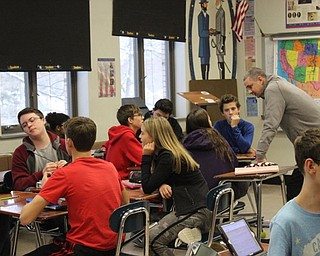 Neighbors | Abby Slanker.Canfield Village Middle School Assistant Principal Michael Flood taught Jarod Turocy’s eighth-grade American History class as part of Canfield Local Schools administrators returning to the classroom for a day on Dec. 12.