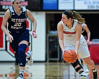 YOUNGSTOWN, OHIO - DECEMBER 28, 2017: Youngstown State's Nikki Arbanas gains possession of the ball after taking it away from Detroit's Nicole Urbanick during the second half of their game on Thursday night at Beeghly Center. Youngstown State won 76-59. DAVID DERMER | THE VINDICATOR