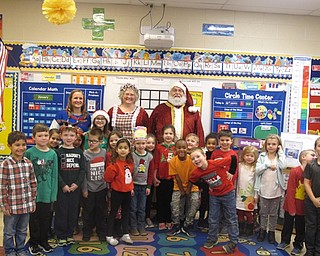 Neighbors | Zack Shively.After the sing along, Santa visited the classrooms at Stadium Elementary. The classrooms held parties organized by the school's PTA. Pictured, Ms. Socie's classroom celebrated the holidays with Santa.