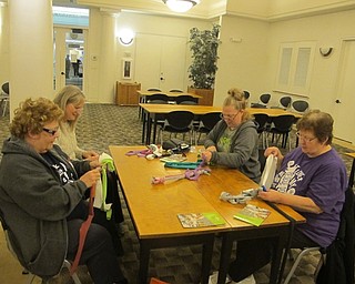 Neighbors | Zack Shively.The people crafting the dog toys took the strips of cloth, tied them in a knot on one end and then braided them together.