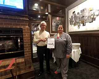 Neighbors | Submitted.Dr. Michelle Anania was awarded an honorary plaque from Ed Hassay, President of the Diabetes Partnership of the Mahoning Valley, for her dedication and support.