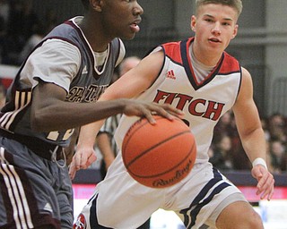William D. Lewis The Vindicator Boarman's Derrick Anderson(10) drives aroundFitch's Blake Baker(3)) during 12-29-17 action at Fitch.