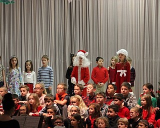 Neighbors | Abby Slanker.Santa and Mrs. Claus made an appearance during Hilltop Elementary School’s second-grade Holidays Around the World program on Dec. 19.