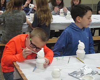 Neighbors | Zack Shively.Students at Poland Dobbins Elementary painted ceramic figures to give to their family for Christmas. Every child in the school participated in the event.