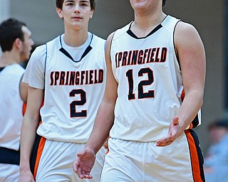 NEW MIDDLETOWN, OHIO - DECEMBER 29, 2017: Springfield's Shane Eynon shows his frustration after being called for a offensive foul during the first half of their game on Friday night at Springfield High School. DAVID DERMER | THE VINDICATOR..Springfield's Drew Clark pictured.