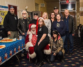 The Autism Society of Mahoning Valley is announcing the families who were presented with this year’s Michael Hull Memorial Family Mini Grant. The grant was divided among six area families for their child or young adult to help improve physical health and wellness. Recipients this year were Creed Taylor, 6, trampoline; Gabrielle Graff, 17, stationary bike; Tanner Hagerty, 10, and Michael Hill, 14, who each received a tablet with case and shield; Destiny Givhan, 13, MD Sports indoor basketball game; and James McQueen, 10, Nintendo game system. In 2014, Melissa Kalaman and her family initiated the effort with the Autism Society to create the Family Mini Grant with proceeds from the Mike Hull Memorial Poker Run for Autism that takes place each summer. Above are the Michael Hull Memorial Family Mini Grant committee at Strikers in Youngstown. Below is Taylor, who shares with his family his delight at receiving a trampoline.
