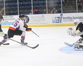 Youngstown Phantoms forward Matthew Barry (26) scores a goal against Muskegon Lumberjacks goalie Adam Brizgala (1) during the second period of a USHL hockey game, Wednesday, Nov. 22, 2017, at the Covelli Centre in Youngstown. Phantoms won 7-3...(Nikos Frazier | The Vindicator)..