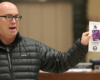 Mayor John McNally reveals the First Night Button during First Night Youngstown, Sunday, Dec. 31, 2017, at 20 Federal Place in Youngstown. ..(Nikos Frazier | The Vindicator)