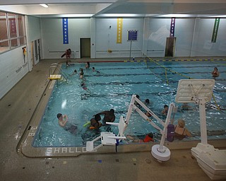 Families enjoy the free swim during First Night Youngstown, Sunday, Dec. 31, 2017, at the YMCA in Youngstown. ..(Nikos Frazier | The Vindicator)