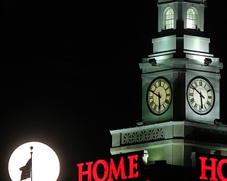 William D. Lewis the Vindicator A super moon rises over the Home Savings clock tower in downtown in Youngsotwn Monday Jan 1 2018. This super moon is known as the Wolf moon.