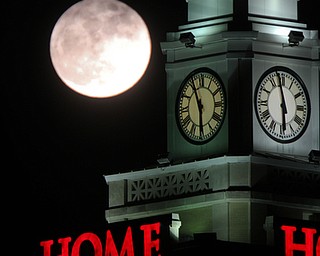 William D. Lewis the Vindicator A super moon rises over the Home Savings clock tower in downtown in Youngsotwn Monday Jan 1 2018. This super moon is known as the Wolf moon.